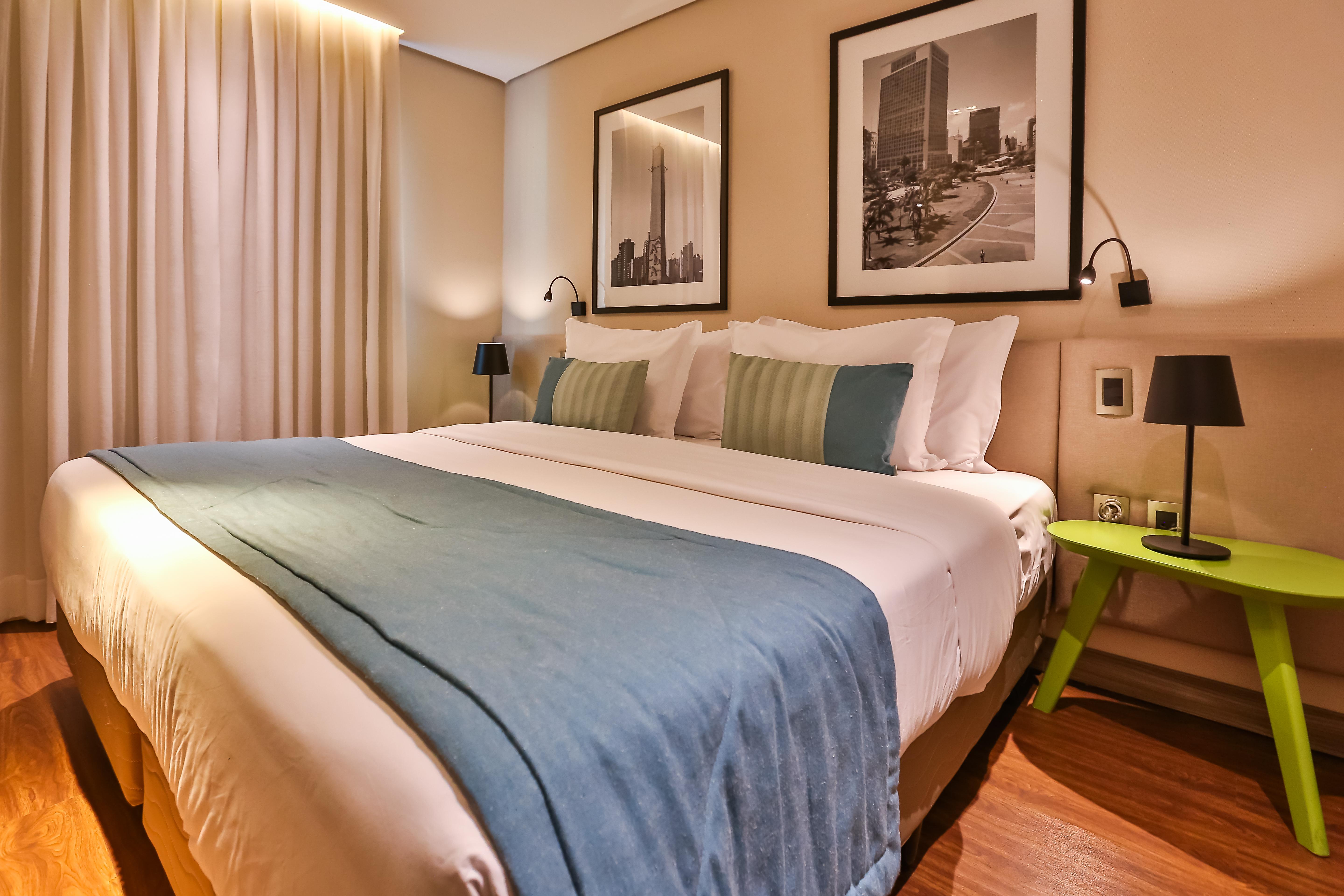 Radisson Vila Olimpia São Paulo Exteriör bild A bedroom at the hotel